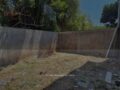 Rumah baru 2 lantai Megah Residence 2 Gunungpati Semarang, tampak pagar besi roster, carport dua mobil, fasad modern kombinasi kayu dan abu-abu, sertifikat Hak Milik ready